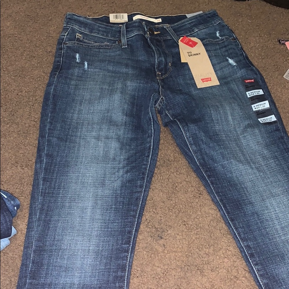 Levis skinny jeans mid rise 711